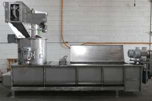 An upgraded Mistcoater supports a longstanding hog industry customer with technological advancements